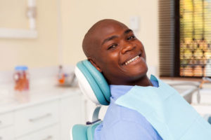 man smiling before extraction